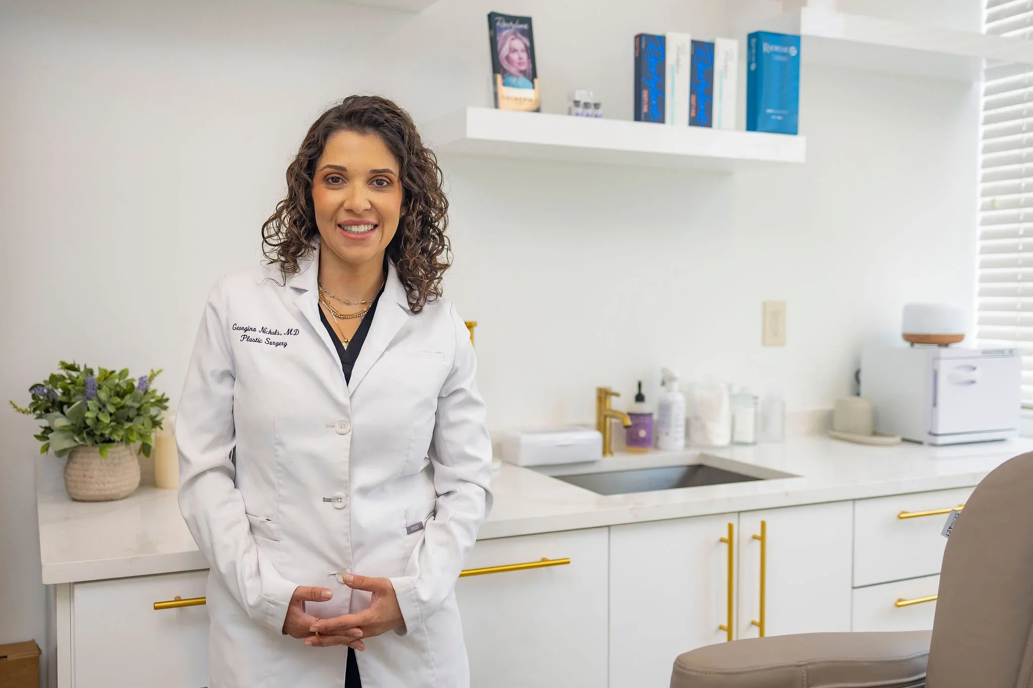 Dr. Georgina Nichols standing in her clinic