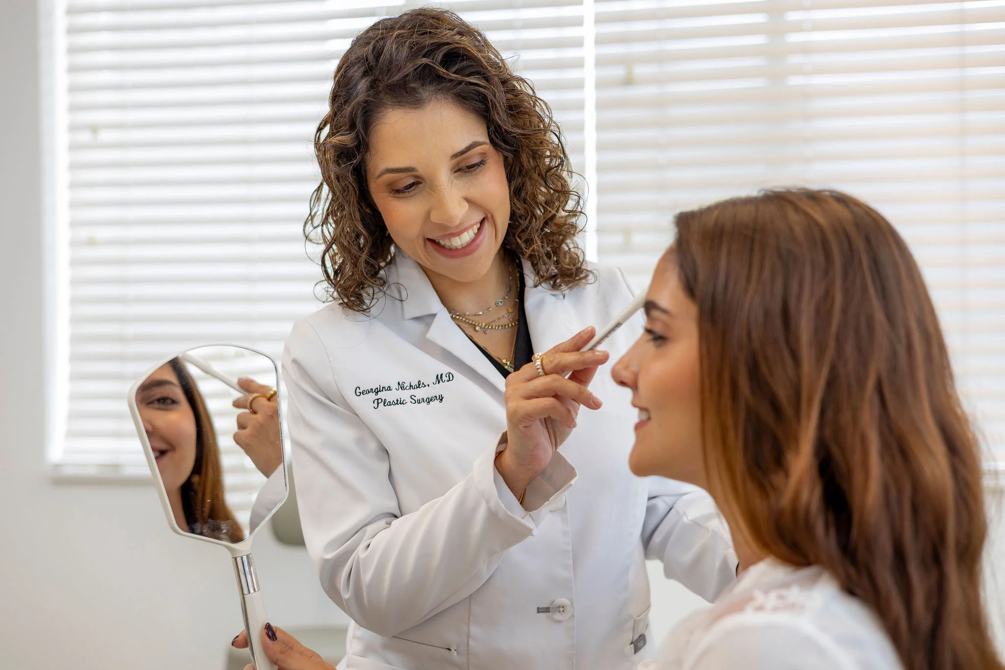 Dr. Georgina Nichols consulting with a patient